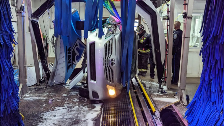 Un barbat s-a rasturnat cu masina intr-o spalatorie automata si a ramas blocat mai bine de o ora Imagine