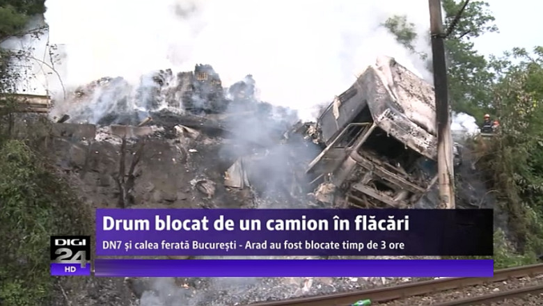 Un camion in flacari incarcat cu biscuiti a blocat DN7 Arad – Deva si calea ferata timp de peste trei ore Imagine