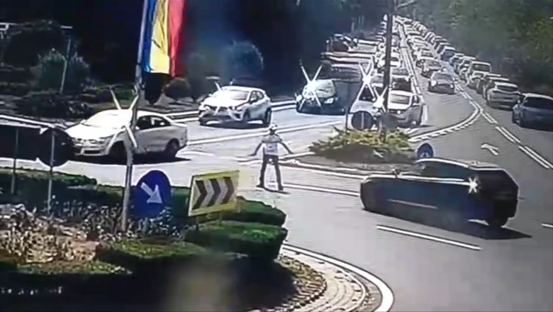 Un politist a fost lovit cu masina de un sofer care n-a respectat semnalele lui, in Eforie Nord. Momentul a fost surprins de camere Imagine