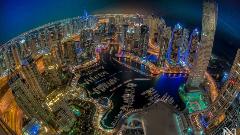 VIDEO Dubai, vazut de la mare altitudine. Un pilot a fotografiat peisajul urban de pe cele mai inalte cladiri Imagine