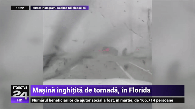 VIDEO O masina este luata pe sus si invartita de o tornada Imagine