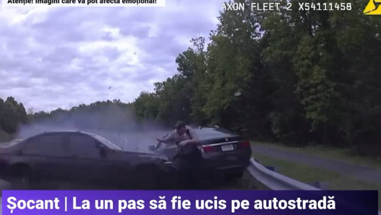 VIDEO Un politist scapa ca prin urechile acului inainte sa fie strivit intre doua masini Imagine